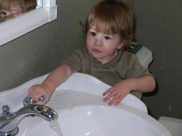 Dominic playing with the water.
March 2008