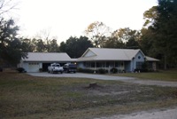 Our house in 2005 - after Hurricane Rita took the pretty oak tree.