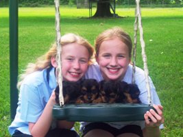 Grand Daughters - Delaney & Christian with 4 of my pups!